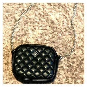 A black cross over body bag